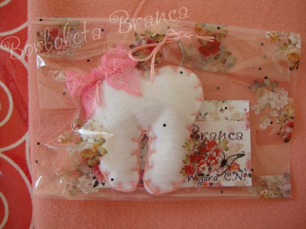 Dentinho detalhe rosa